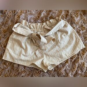 Like new tan and white pinstripe tie waist shorts
